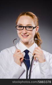 Woman doctor with the stethoscope