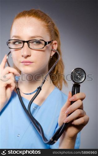 Woman doctor with the stethoscope