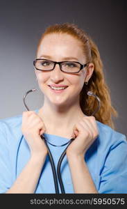 Woman doctor with the stethoscope