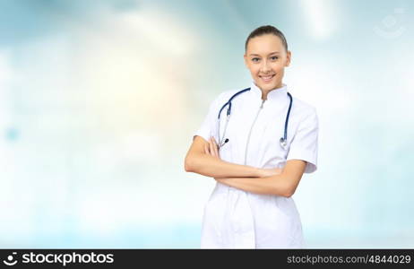 Woman doctor. Young attractive woman doctor with stethoscope on neck