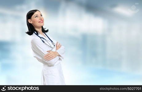 Woman doctor. Young attractive woman doctor with stethoscope on neck