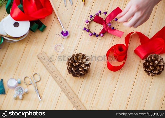 Woman doiing DIY festive decorations at home
