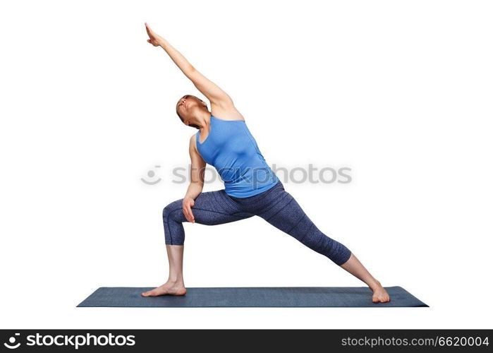 Woman doing Ashtanga Vinyasa yoga asana Utthita parsvakonasana - extended side angle pose beginner variation isolated on white. Woman doing Ashtanga Vinyasa yoga asana Utthita parsvakonasana