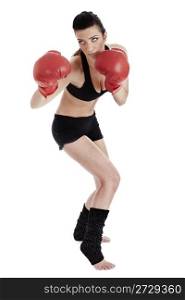 Woman doing boxing poses with red gloves over white background