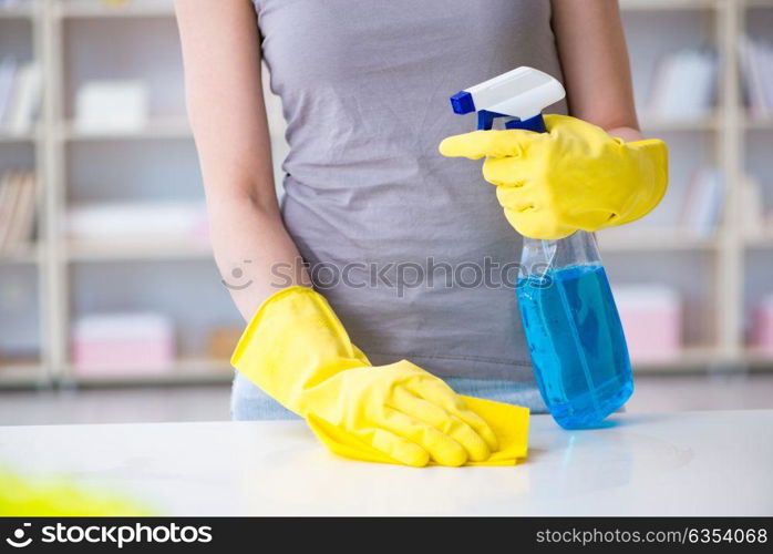 Woman doing cleaning at home