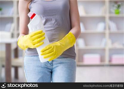 Woman doing cleaning at home. The woman doing cleaning at home