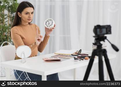 woman doing commercial with clock