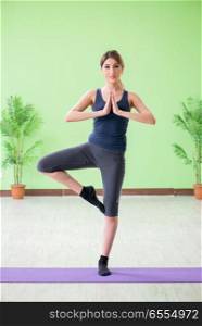 Woman doing exercises at home