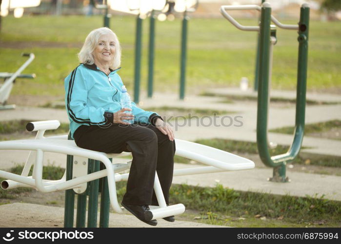 Woman doing Exercises for Legs Outdoors in the Bright Autumn Evening