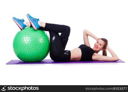 Woman doing exercises with ball on white