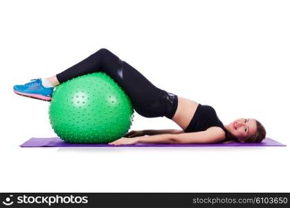 Woman doing exercises with ball on white