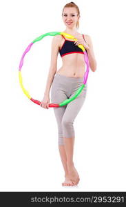 Woman doing exercises with hula hoop