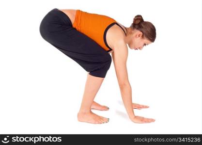 Woman doing first stage of yoga exercise called: Chair Pose, sanskrit name: Utkatasana, isolated on white