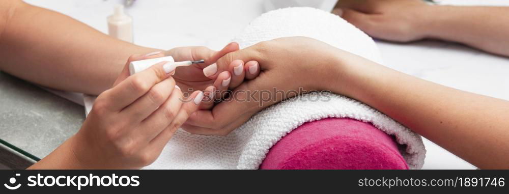 woman doing her manicure salon. Resolution and high quality beautiful photo. woman doing her manicure salon. High quality and resolution beautiful photo concept