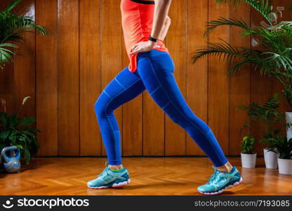 Woman doing High-intensity interval training at home