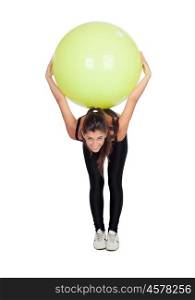 Woman doing pilates with a ball isolated on white background