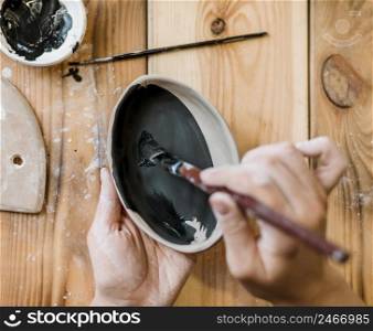 woman doing pottery masterpiece 3