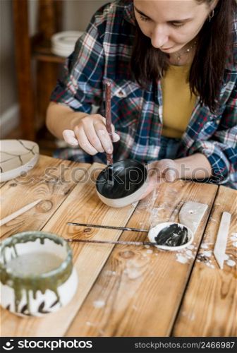 woman doing pottery masterpiece 5