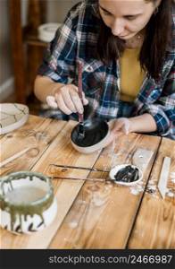 woman doing pottery masterpiece 5