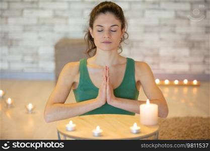 woman doing yoga at home with small space