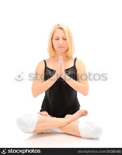 Woman doing yoga isolated over white