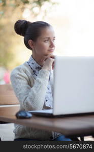 woman dreaming during work outdoor