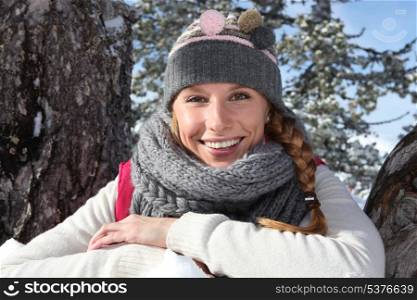 Woman dressed in appropriate snow clothes