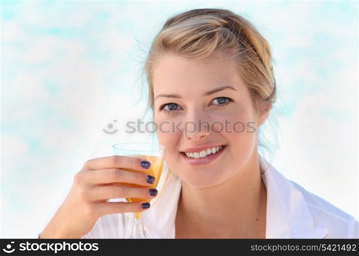 woman drinking a cocktail