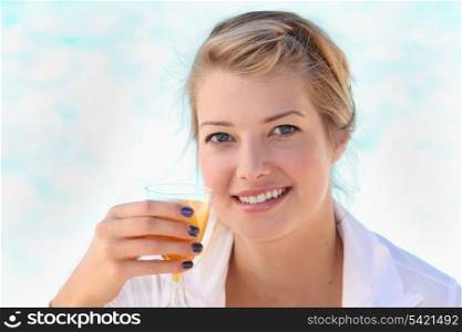 woman drinking a cocktail