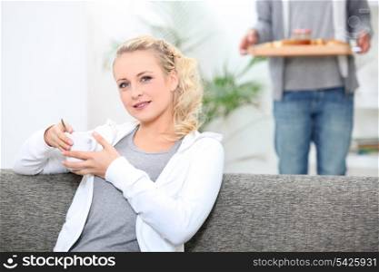 Woman drinking a cup of coffee