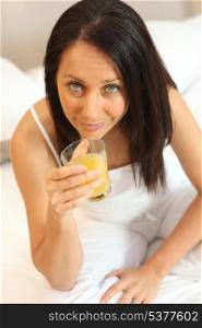 Woman drinking a glass of juice