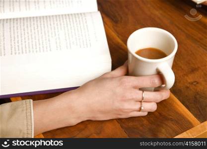 Woman Drinking Coffee and Studying