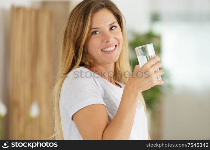 woman drinking glass of water