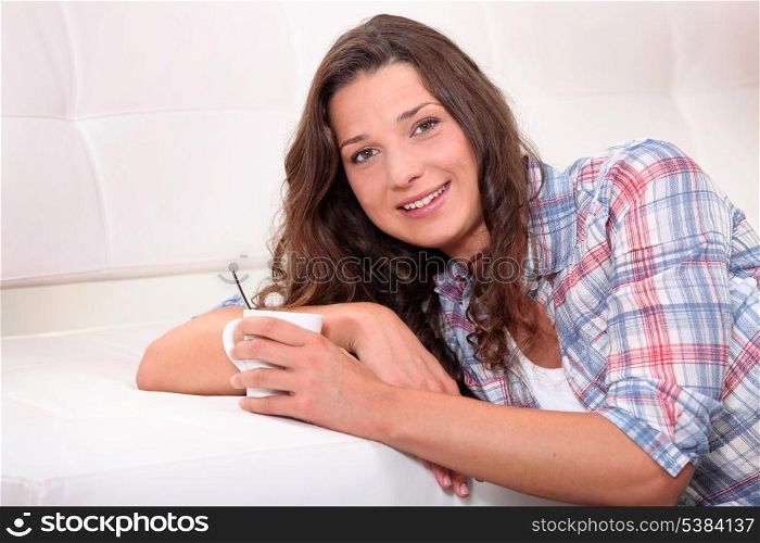 Woman drinking hot drink