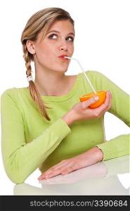 Woman drinking orange on white background