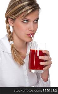 Woman drinking tomato juice on white background