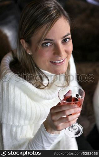 Woman drinking wine alone
