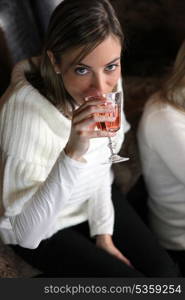 Woman drinking wine with friends