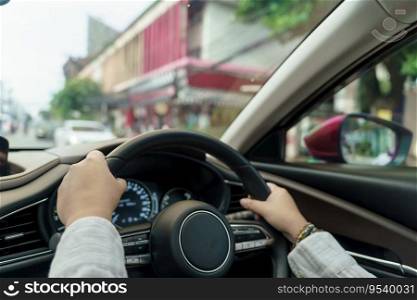 Woman driving car. girl feeling happy to drive holding steering wheel and looking on road.