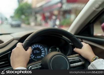 Woman driving car. girl feeling happy to drive holding steering wheel and looking on road.