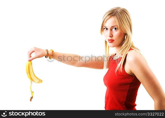woman dropping a banana skin with intent