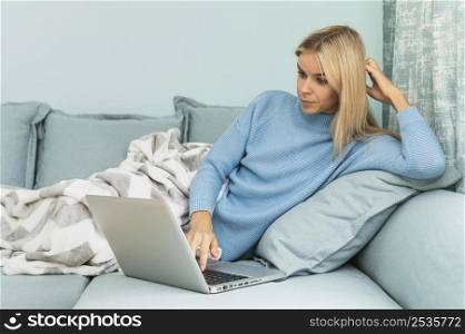 woman during pandemic working laptop home