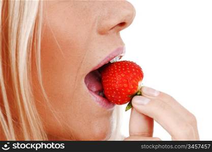 woman eat strawberry macro close up