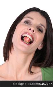 Woman eating a candy