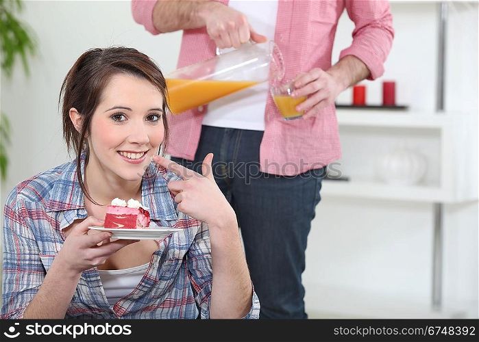 Woman eating a piece of cake