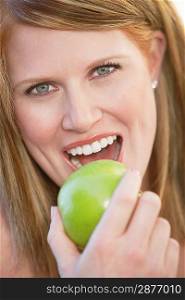 Woman Eating Apple