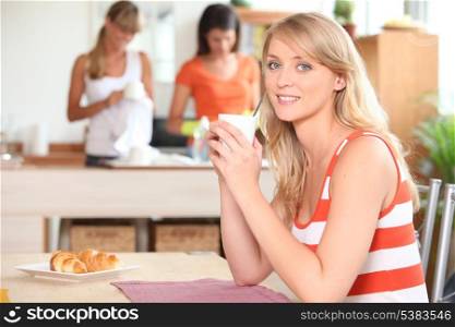 Woman eating breakfast