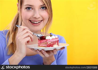 Woman eating cake