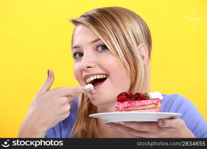 Woman eating cake