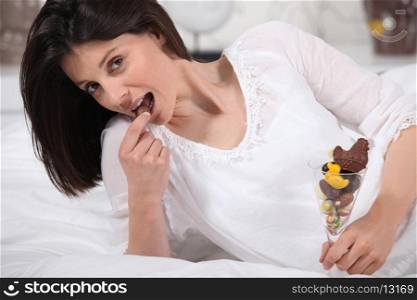 Woman eating Easter egg